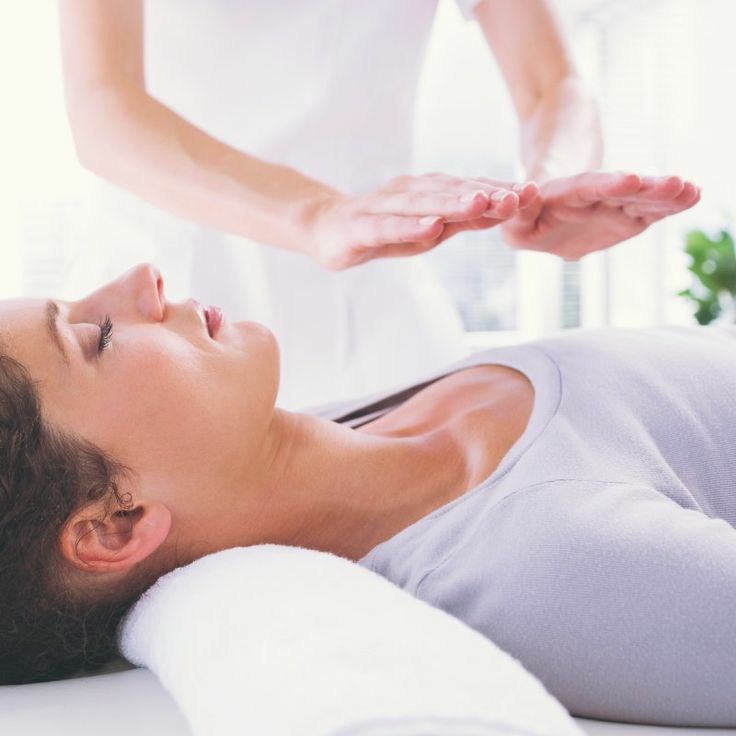 Sesión de Reiki con imposición de manos